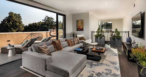 Beautiful living room inside a luxury condo at the terraces at the ambassador gardens